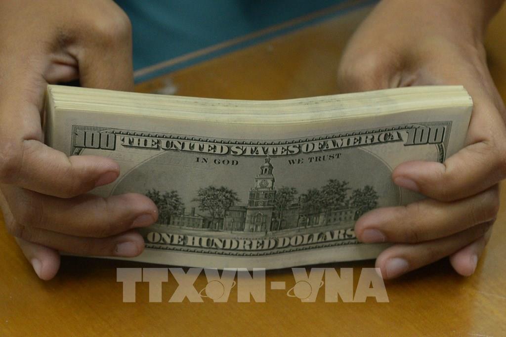 Đồng USD giữ vững đà tăng cả tuần bất chấp biến động địa chính trị