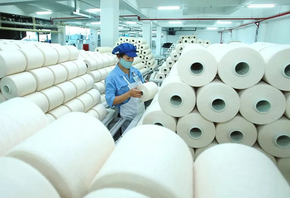 doanh-nghiep-det-may-vuot-song-thanh-cong